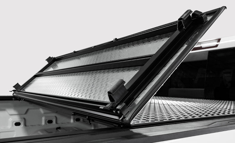 Access 2019+ Chevy/GMC 1500 5ft 8in Bed LOMAX Tri-Fold Cover - Urethane Diamond Plate