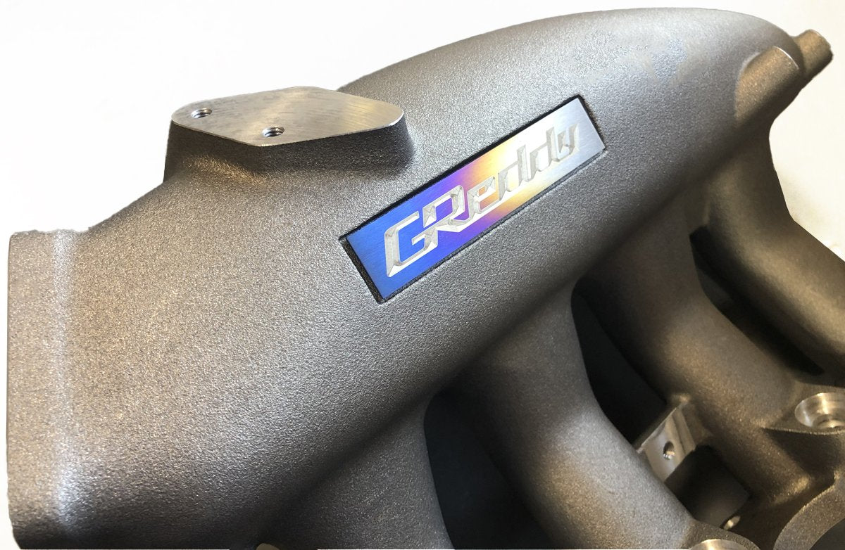 GReddy Titanium Intake Manifold Badge (105mm X 20mm)